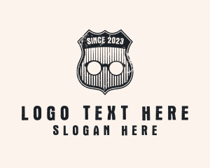 Lens - Grunge Eyewear Shield Badge logo design