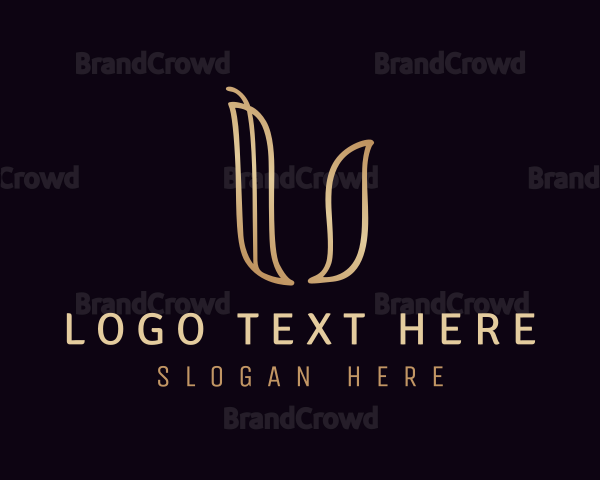 Gold Calligraphy Letter U Logo