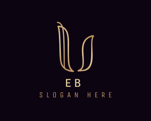 Fashion - Gold Calligraphy Letter U logo design