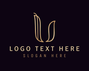 Gold Calligraphy Letter U Logo