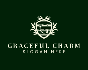 Ornate Floral Shield logo design