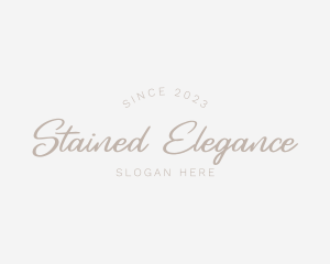 Elegant Cursive Fashion logo design