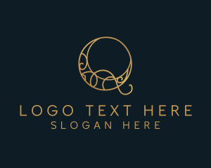 Boutique - Gold Decorative Letter Q logo design
