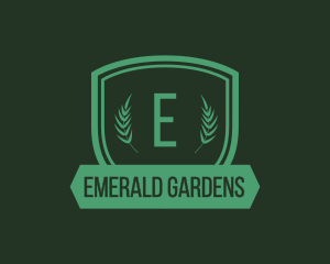 Botanical Shield Wreath logo design