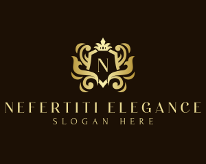 Elegant Crown Shield Ornament logo design