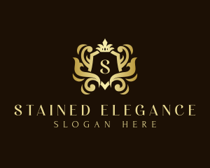 Elegant Crown Shield Ornament logo design