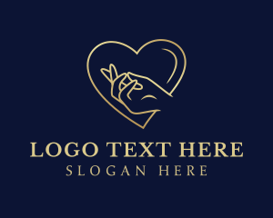 Valentine - Gold Heart Hand Charity logo design