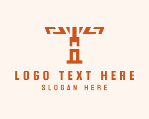 Aztec Totem Pole Letter T Logo