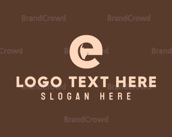 Brown Ram Head Letter E Logo