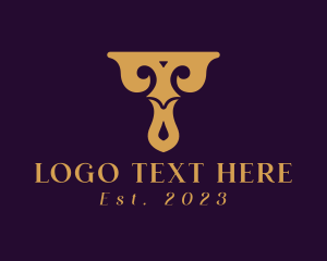 Ancestral - Luxury Flourish Ornament Letter T logo design