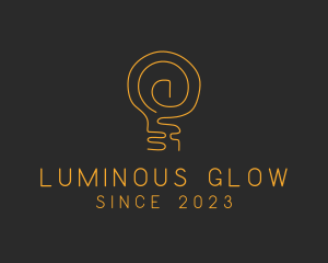 Illuminated - Gold Bulb Lamp logo design