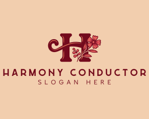 Cursive Floral Letter H logo design