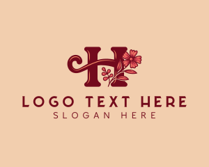 Letter H - Cursive Floral Letter H logo design