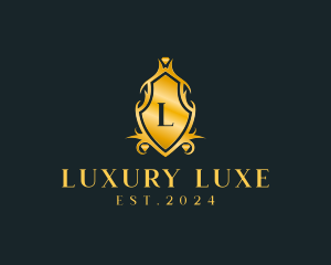 Luxurious Ornamental Shield Crest logo design