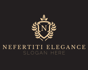 Elegant Crown Shield Emblem logo design