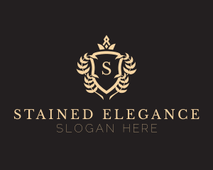 Elegant Crown Shield Emblem logo design