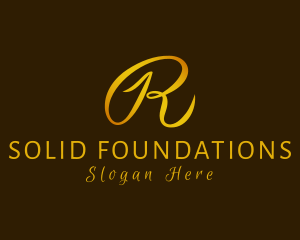 Handwriting - Gold Cursive Letter R logo design