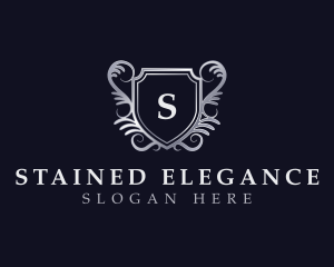 Premium Deluxe Shield logo design