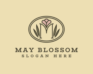 Elegant Floral Oval Letter M logo design