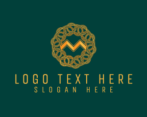 Centerpiece - Intricate Gold Letter M logo design