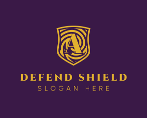 Defend - Gold Spiral Shield Letter A logo design