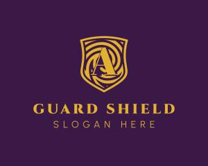 Defend - Gold Spiral Shield Letter A logo design