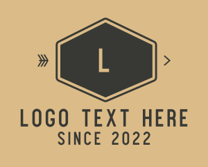 Brown Hexagon Business Letter Logo