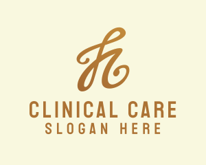 Elegant Bronze Letter H logo design