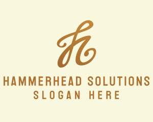 Elegant Bronze Letter H logo design