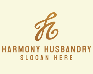 Elegant Bronze Letter H logo design