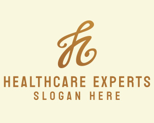 Elegant Bronze Letter H logo design