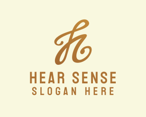 Elegant Bronze Letter H logo design