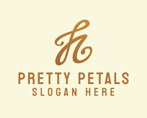 Elegant Bronze Letter H logo design