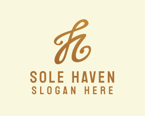 Elegant Bronze Letter H logo design