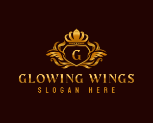 Ornamental Crown Wings logo design