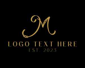 Gold - Elegant Jewelry Letter M logo design