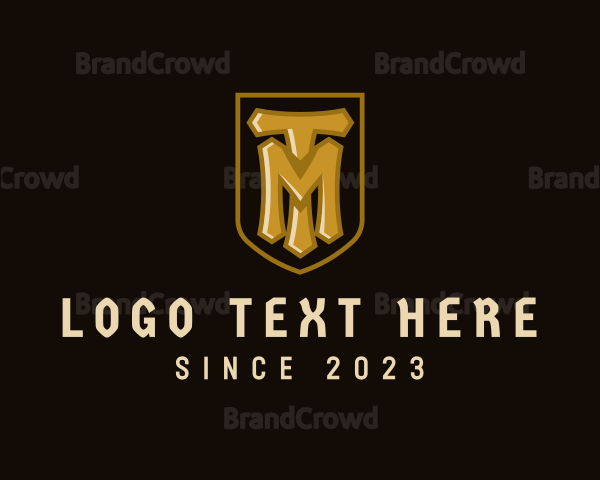 Golden Shield Gamer Letter TM Logo