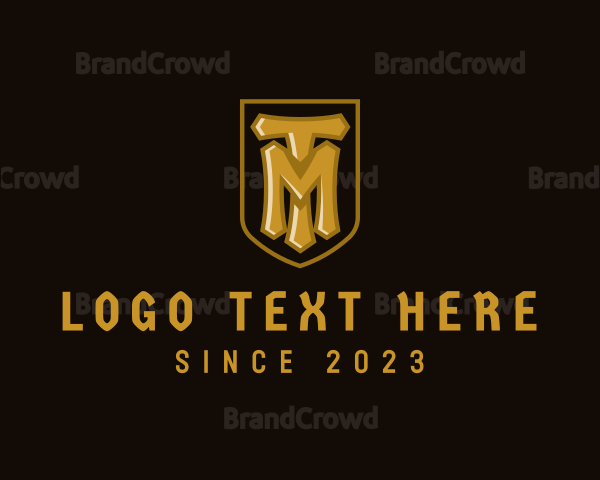 Golden Shield Gamer Letter TM Logo