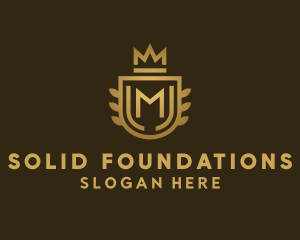 Monarch - Crown Shield Letter M logo design