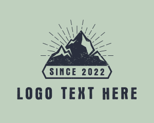 Camper - Rustic Mountain Summit logo design