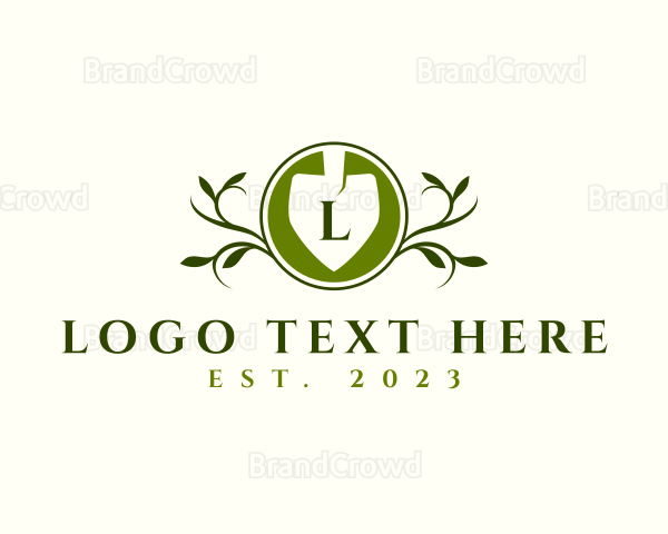 Shovel Landscaping Leaves Logo