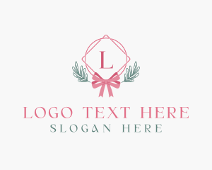 Souvenir - Ribbon Leaf Ornament logo design