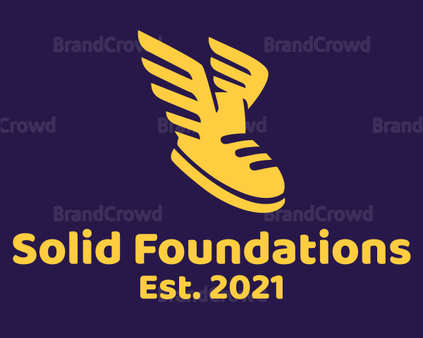 Yellow Flying Shoe Logo