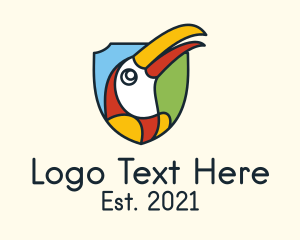 Travel Blogger - Toucan Bird Shield logo design