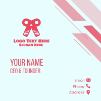 Pink Ribbon Scissors Business Card Design