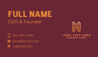 Gold Monoline Letter M Business Card Design